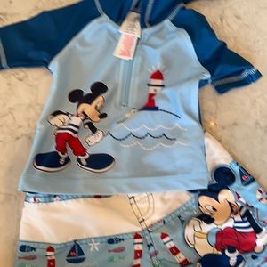 Bundle: two Disney boys swimsuits and one polo